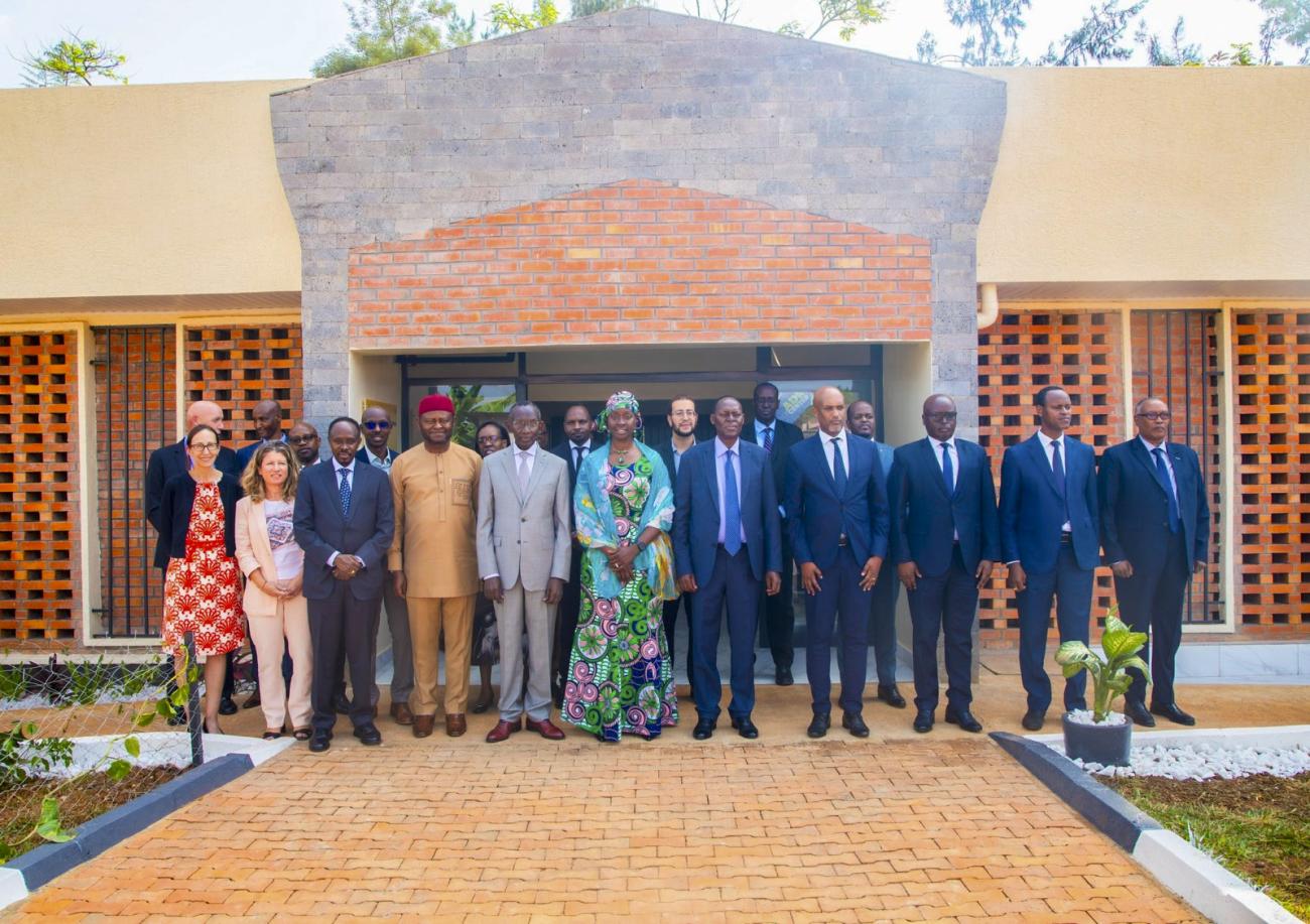 Government officials and partners gathered for a group photo to celebrate the opening of the ADR center