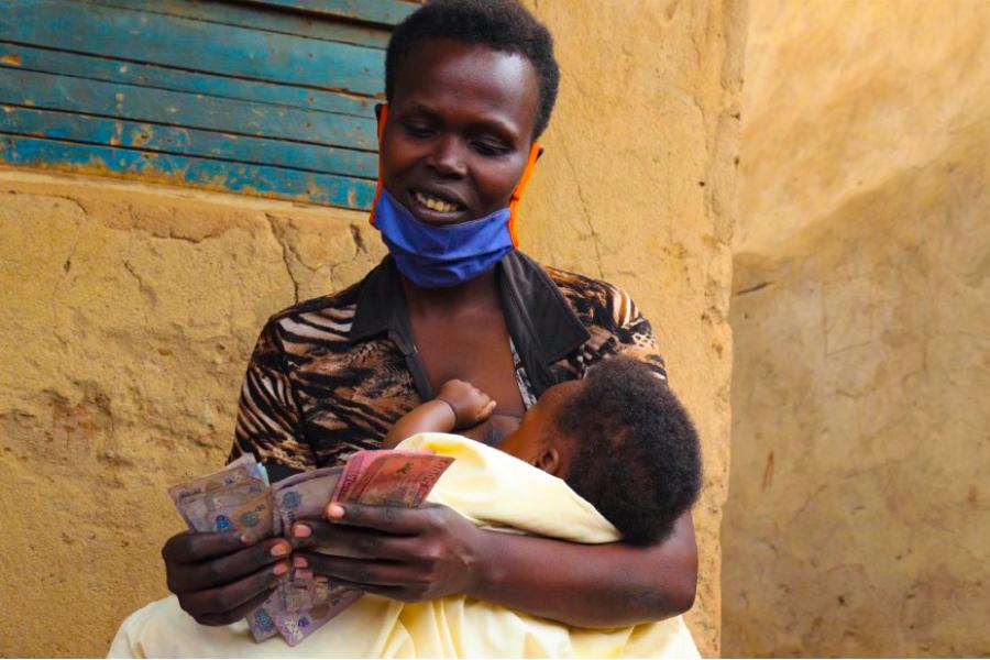 Joselyne’s children receive a daily nutritious snack of porridge on school days, and she is supported with a monthly cash transfer of 49,000 Rwandan Francs (US$48) which helps her to meet her family’s basic needs. Photo: WFP/JohnPaul Sesonga