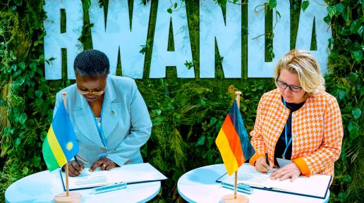Rwanda’s Minister of Environment signing an NDC facility partnership with Germany’s Federal Minister of Economic Cooperation and Development at COP 27 in Sharm el-Sheikh, Egypt
