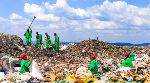 Efficiently tackling waste management together: a group of dedicated youth sorting, recycling, and disposing of waste responsibly at Green Care Rwanda Ltd, ensuring a cleaner and greener Huye.